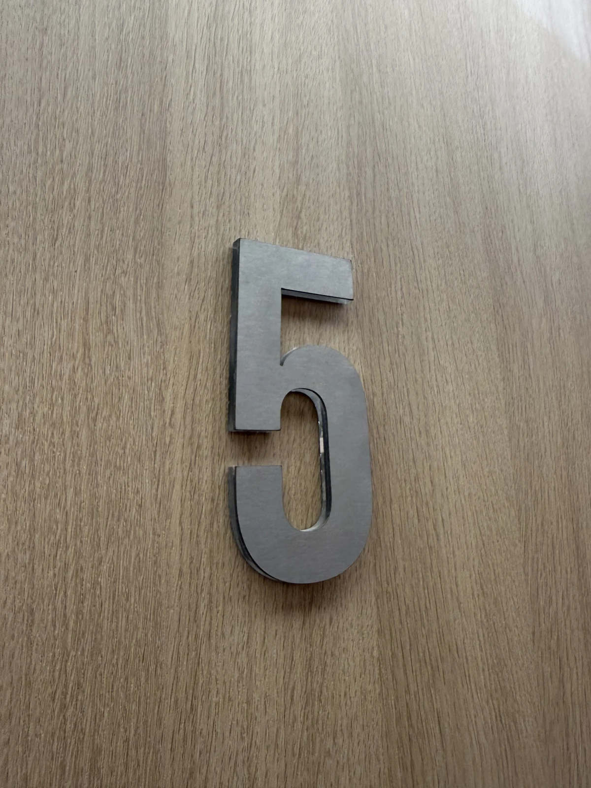 Installed metal door numbers